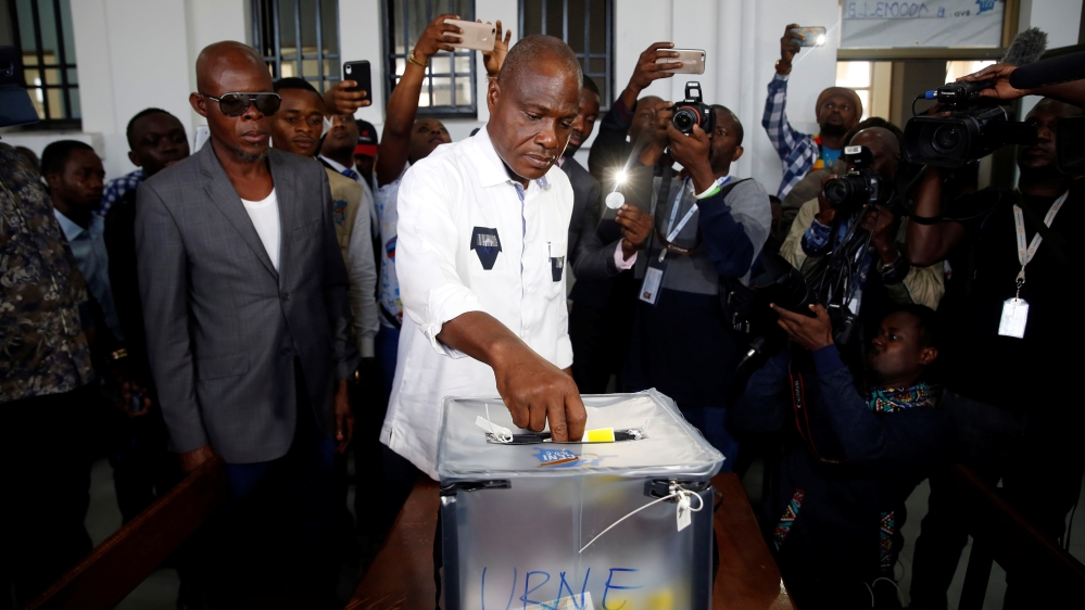 Martin Fayulu, Congolese joint opposition Presidential candidate, casts his vote at a polling station in Kinshasa [Baz Ratner/Reuters]