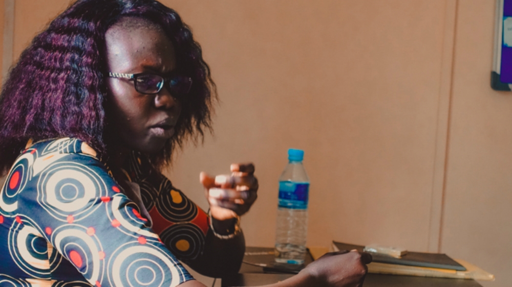 Suzan Kim Otor never wanted to bleach her skin despite many encouraging her to do so [Jasmin Bauomy/Al Jazeera]