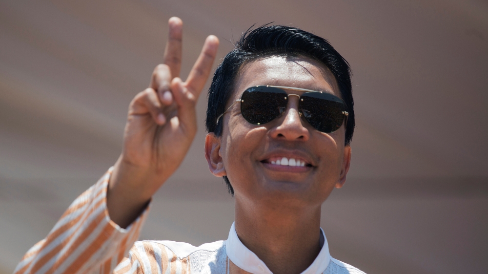 Andry Rajoelina, president of Madagascar, salutes supporters in a 2018 campaign rally