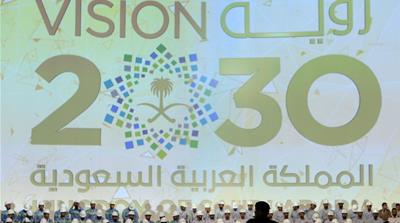 MBS's Vision 2030 economic initiative aims to push the Kingdom past fossil fuel dependency through investments in infrastructure and tech, though some say its unrealistic [Zuhair Al-Traifi/Reuters]