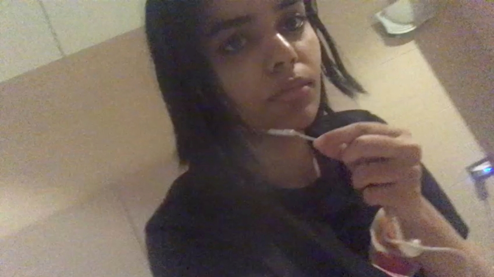 Rahaf Mohammed al-Qunun, a Saudi woman who claims to be fleeing her country and family, speaks in a room in Bangkok