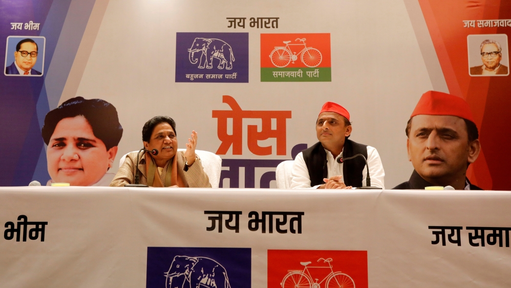 BSP chief Mayawati speaks as Akhilesh Yadav, chief of SP, looks on during a joint news conference to announce their alliance for the upcoming national election, in Lucknow