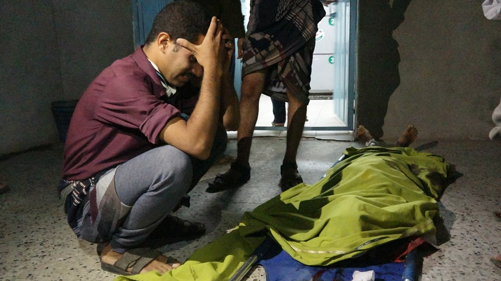 Yemeni mourns after his family member was killed by Houthi shelling