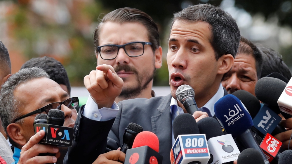 Venezuela's opposition leader Juan Guaido is trying to freeze banks accounts in Switzerland [RManaure Quintero/Reuters]