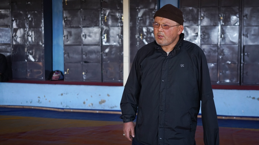 Coach Ghulam Abbas lost his arm when a suicide bomber attacked the wrestling gym [Sorin Furcoi/Al Jazeera]