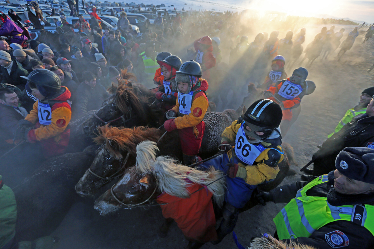 Changes to Mongolia’s laws on horse racing have come in stages. In 2011, a law required jockeys to wear helmets and that jockeys must be at least seven years old, but there has been dispute over which