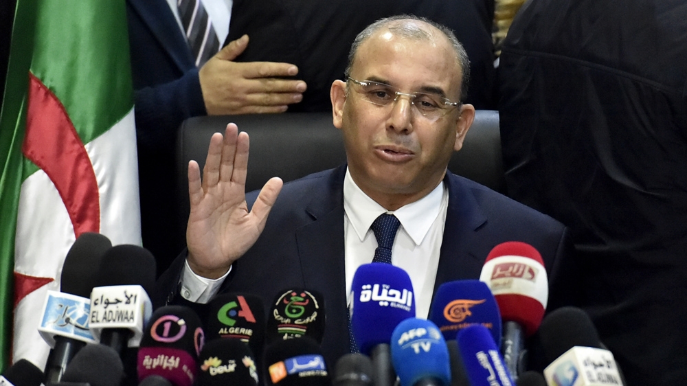 Abdelghani Zaalane, Bouteflika's campaign manager, submitted the president's candidacy papers on his behalf [Ryad Kramdi/AFP]