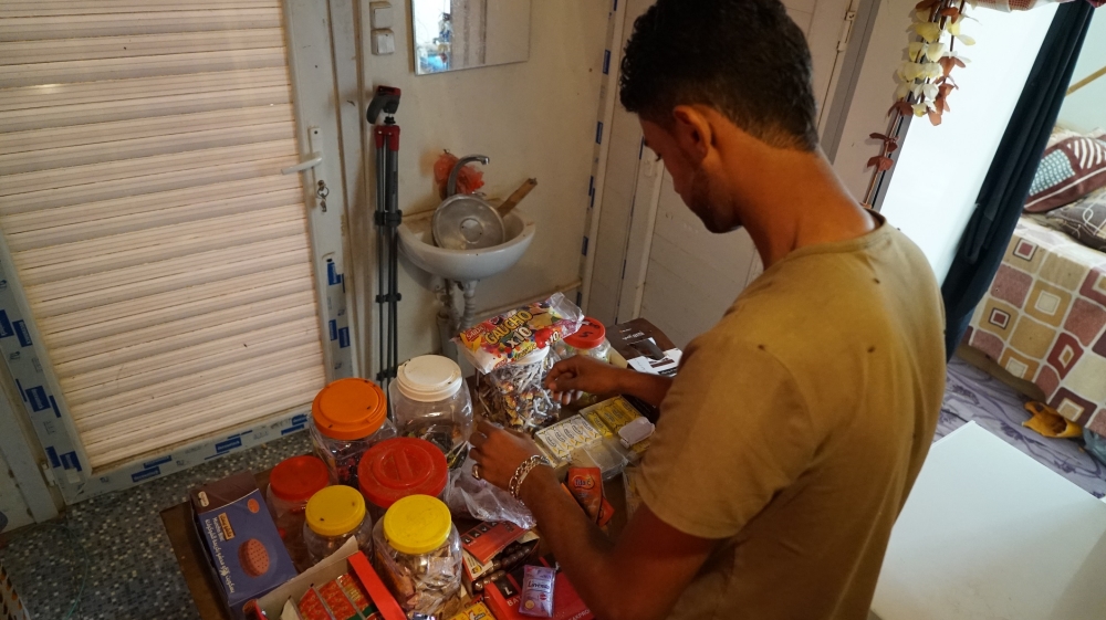 
Ahmed Muhammad Ali says his mother sold all her jewellery so the family could start their business [Faisal Edroos/Al Jazeera] 