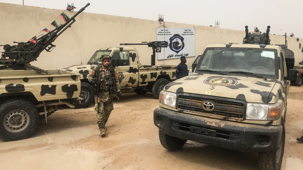 Local militiamen say they seized vehicles from Haftar's forces in the coastal town of Zawiya, west of Tripoli [Mahmud Turkia/AFP]
