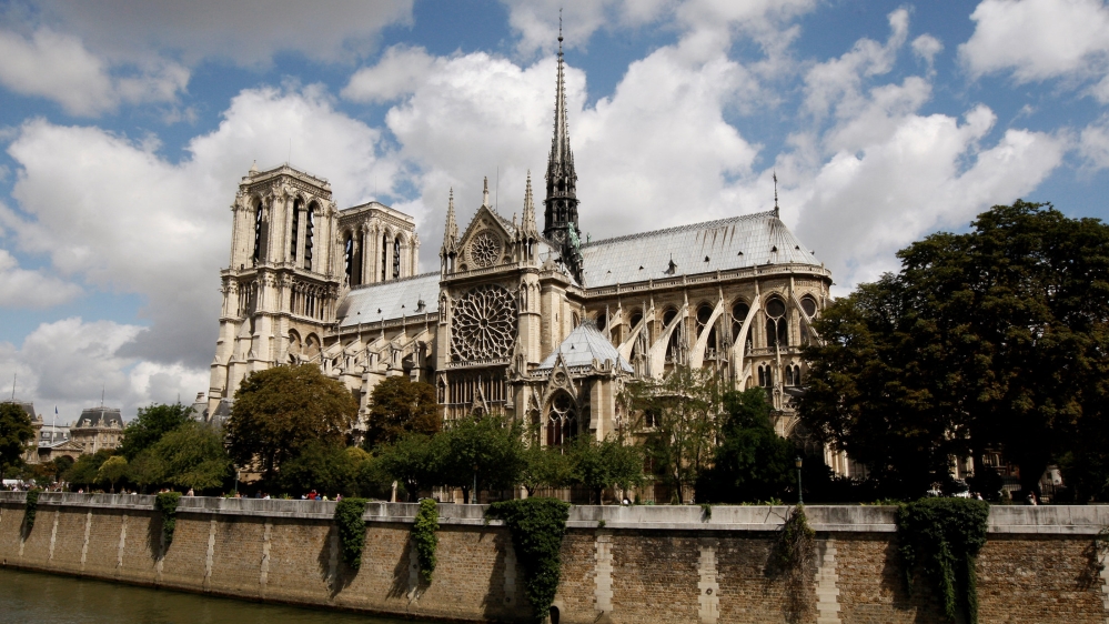 FILE PHOTO: A general view shows Paris Notre Dame Cathedral from the banks of the river Seine