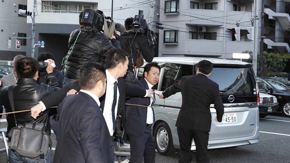 A van believed to be carrying former Nissan Motor Chairman Carlos Ghosn leaves Ghosn''s residence in Tokyo