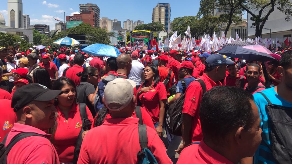 Government supporters near the presidential palace in Caracas [Alicia Hernandez/Al Jazeera] 