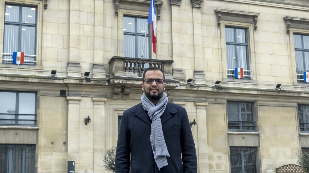 Jawad Bachare, executive director of CCIF, in front of the Saint Ouen city hall on the outskirts of Paris, France [Omar Havana/Al Jazeera] 