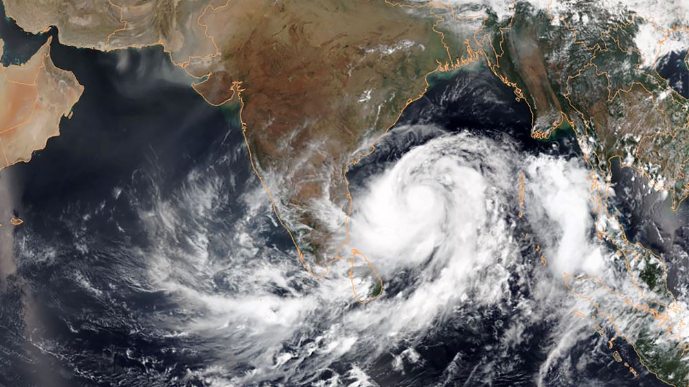 This May 1, 2019, satellite image obtained courtesy of the National Oceanic and Atmospheric Administration (NOAA) shows tropical Cyclone Fani intensifying in the Bay of Bengal [HO/NOAA/AFP]