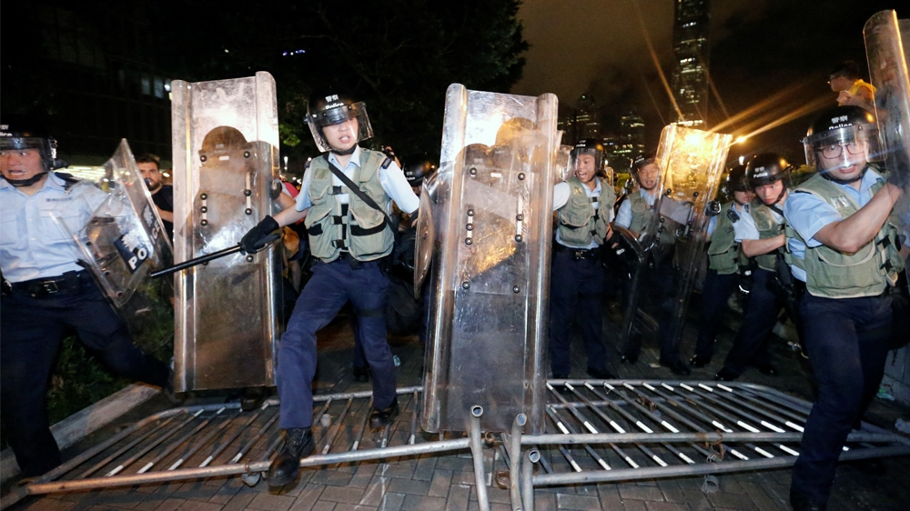 Riot police arrives during a protest to demand authorities scrap a proposed extradition bill with China, in Hong Kong, China June 10, 2019. REUTERS/Thomas Peter