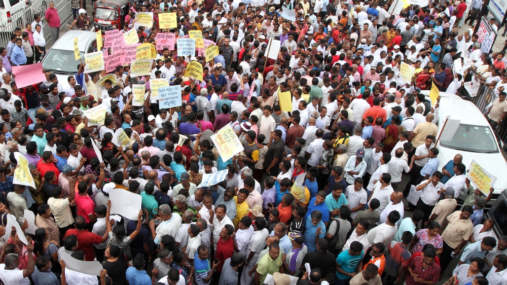 Members from the opposition parties protest against Muslim ministers, opposite Fort railway station in Colombo, Sri Lanka 3 June 2019. A Buddhist monk and government parliamentarian Ven. Athureliye Ra