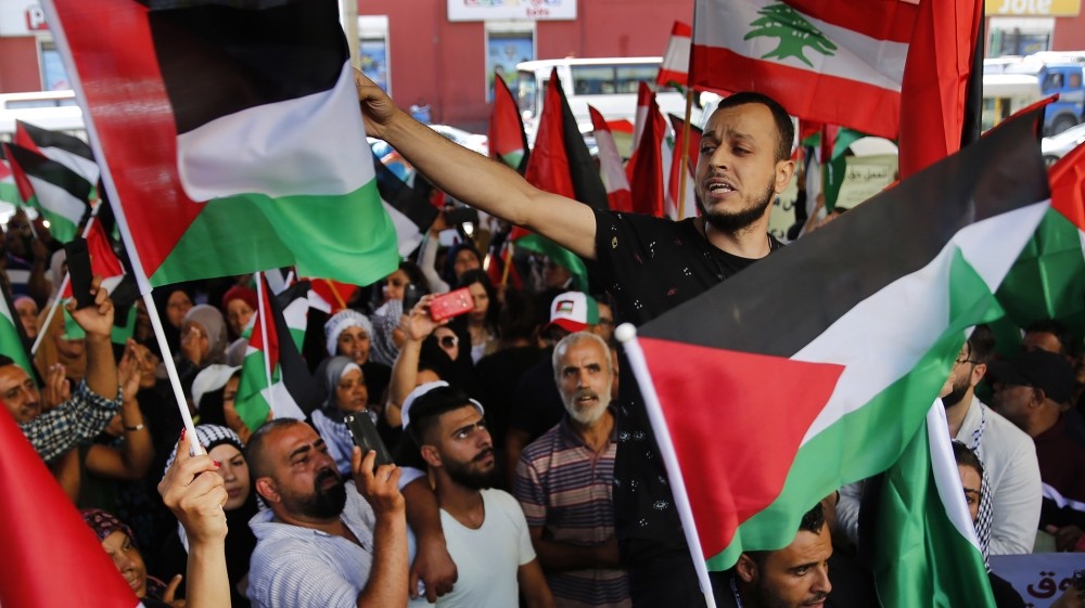 A Palestinian protester shouts slogans, during a protest against the crackdown on foreign labor, in Beirut, Lebanon, Tuesday, July 16, 2019. Hundreds of Palestinians held a protest against the Labor M
