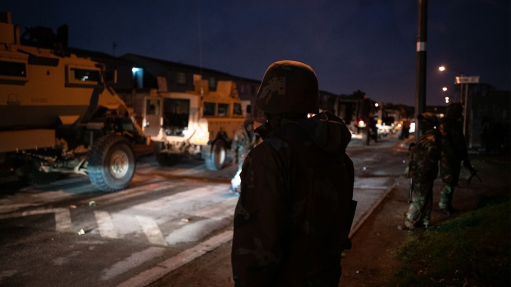 Armoured vehicles in Manenberg, a heavily gang-afflicted area on the Cape Flats [Shaun Swingler/Al Jazeera]