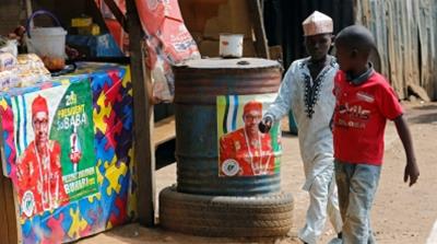 boys walk past a tea shop d