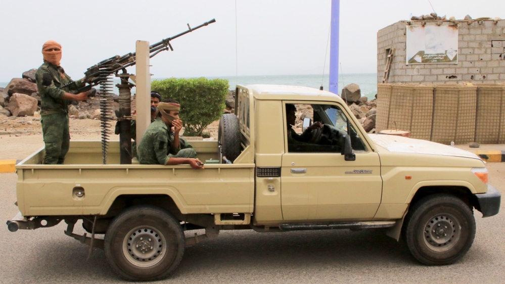 Bodyguards of Yemen''s southern separatist leaders are seen on a vehicle during a funeral for Brigadier General Muneer al-Yafee and his comrades killed in a Houthi missile attack, in Aden