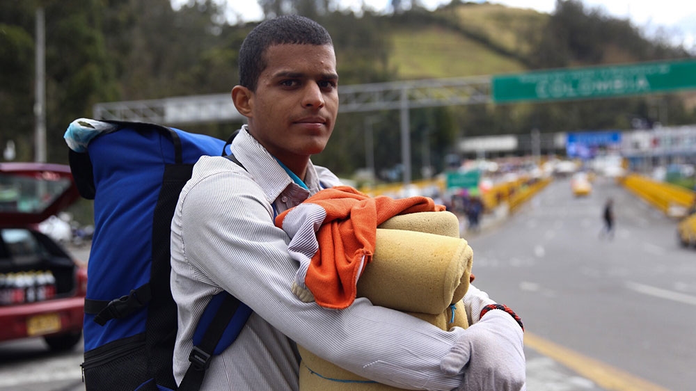 Venezuelans race to Ecuador [Pu Ying Huang/Al Jazeera]