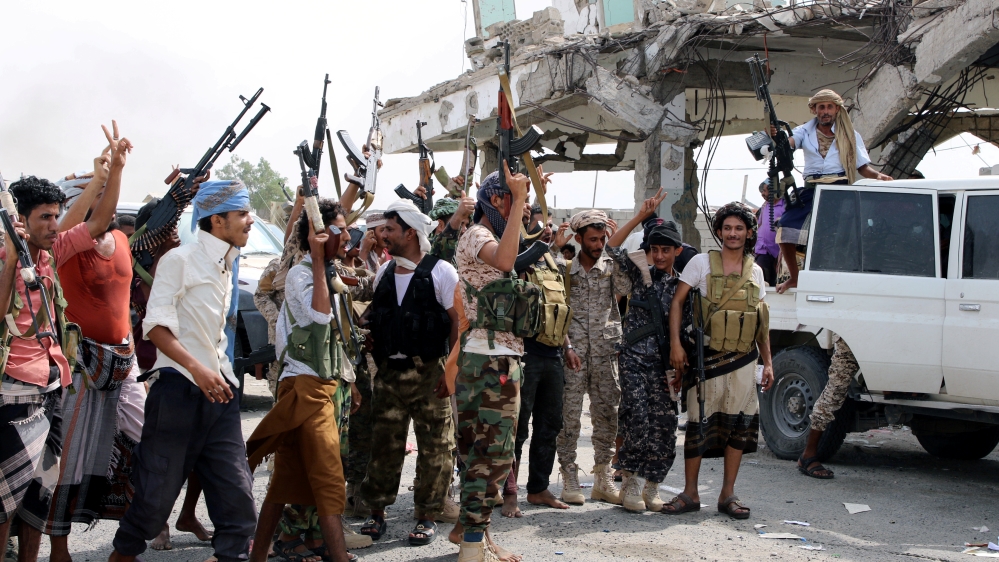 Southern separatist fighters are pictured during clashes with government forces in Aden