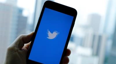 The Twitter App loads on an iPhone in this illustration photograph