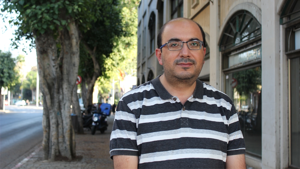 Sami Abu Shahada, leader in the Tagamou or Balad party, says the Joint Arab List is hoping to encourage enough Palestinian citizens of Israel to vote [Arwa Ibrahim/Al Jazeera]