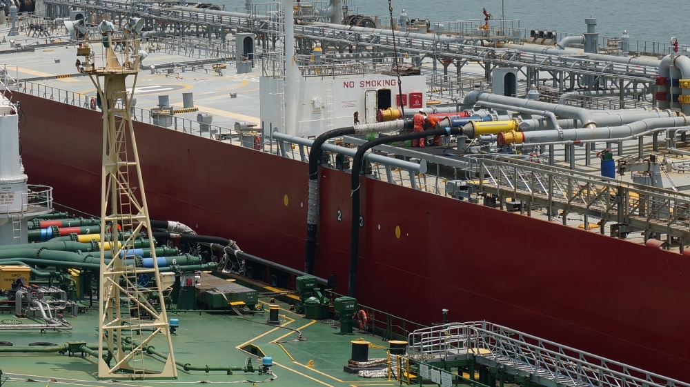 An oil tanker for blending to reproduce low-sulphur fuel oil with half-finished products of SK Trading International is seen during a marine blending at the sea off Singapore