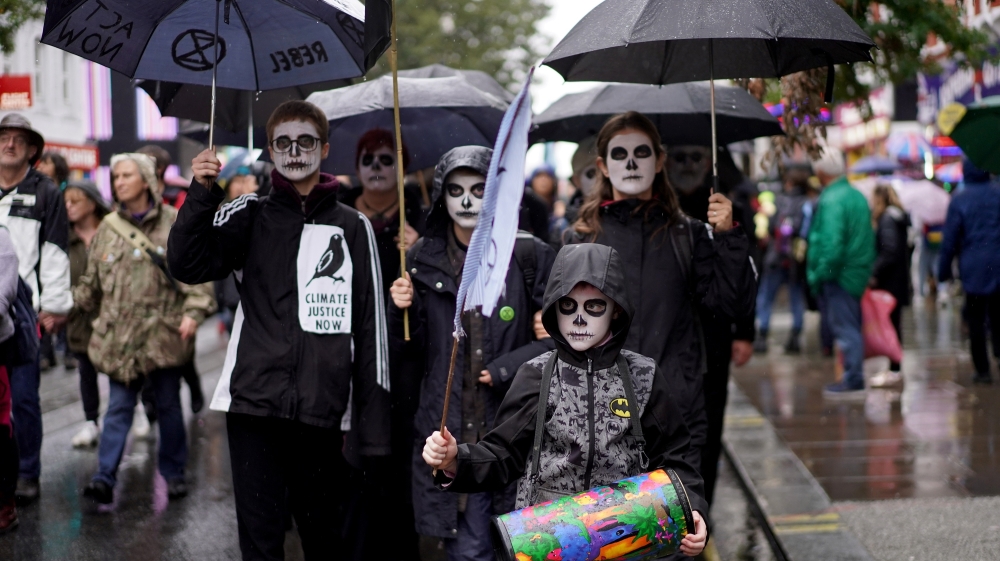 Climate change activists attend an Extinction Rebellion demonstration in London, Britain, October 12, 2019
