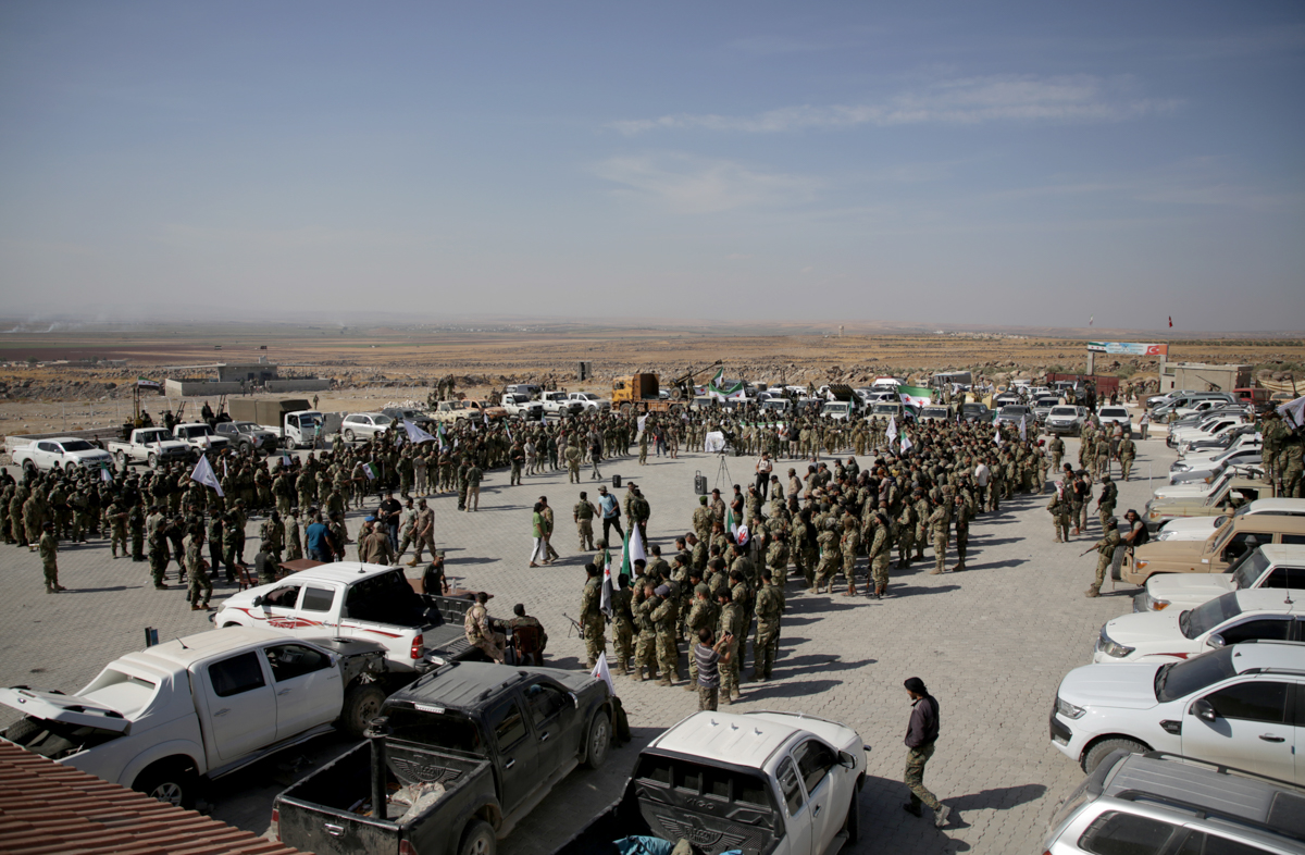 ALEPPO, SYRIA - OCTOBER 08: Syrian National Army forces are dispatched to Manbij front line ahead of Turkey''s planned operation in the east of the Euphrates River in northern Syria in Aleppo, Syria on