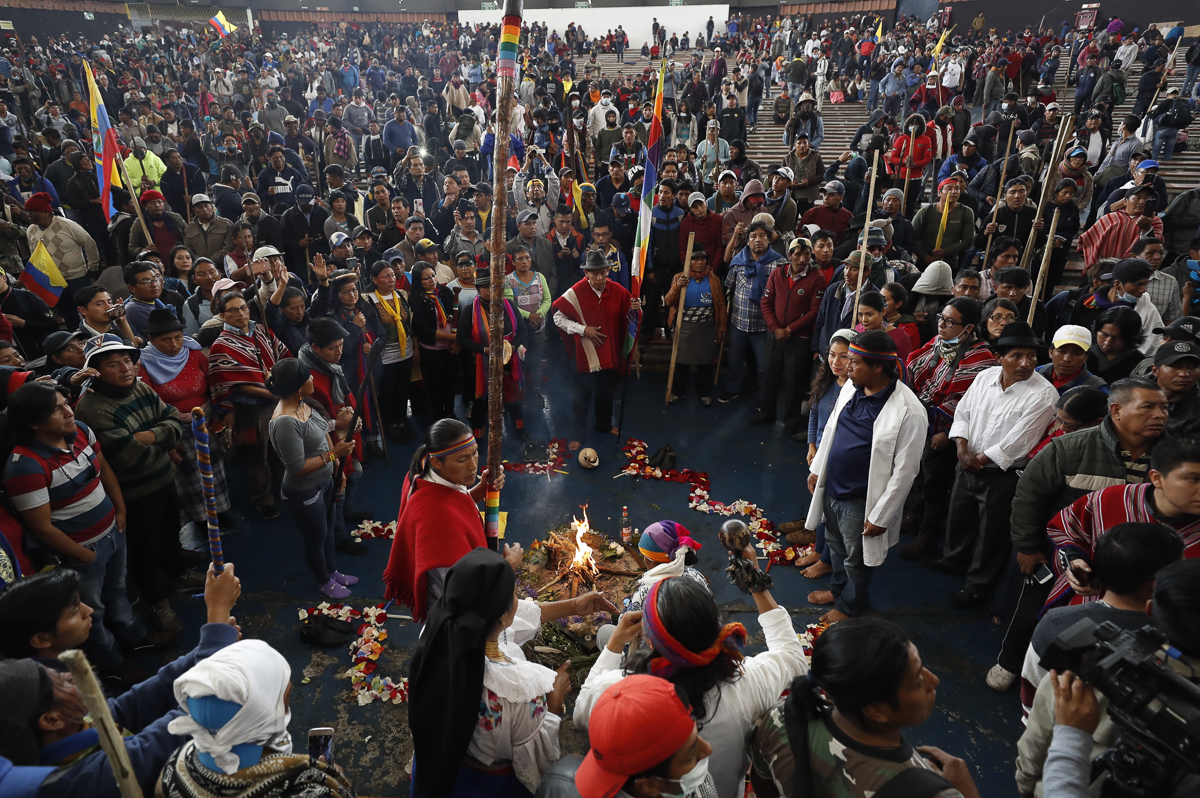 Indigenous people perform a ritual during a protest in Quito, Ecuador, 11 October 2019. Hundreds of warriors from the Ecuadorian Amazon joined the protests of indigenous people in Quito against the go