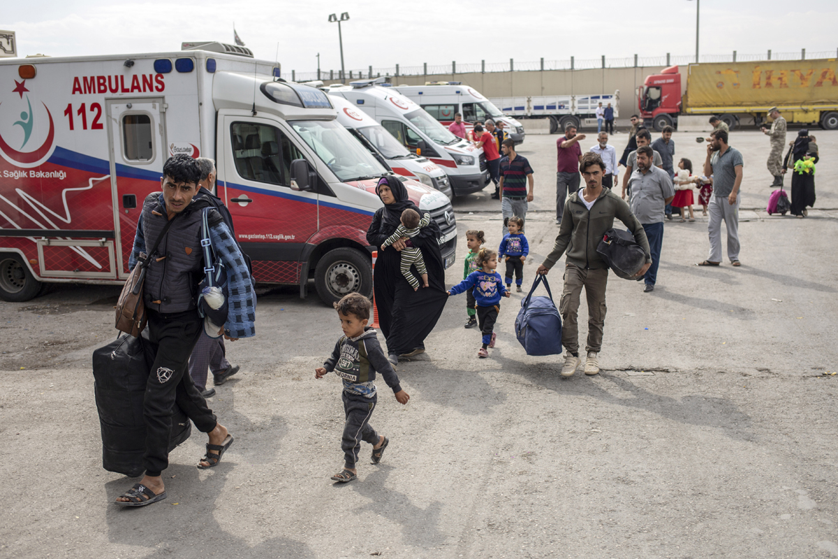 Syrian families who were inside the country for months returned ahead of schedule, citing instability