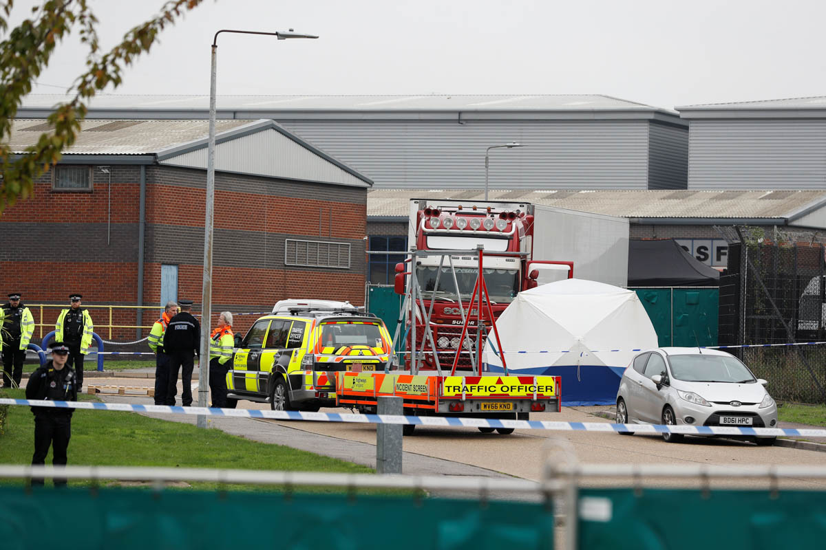 Police is seen at the scene where bodies were discovered in a lorry container, in Grays, Essex, Britain October 23, 2019. REUTERS/Peter Nicholls