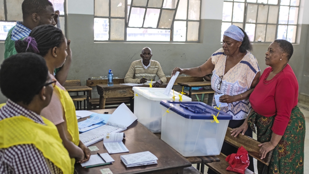 Two women cast their votes at a polling station in Maputo, Mozambique, 15 October 2019. 12.9 million Mozambican voters will choose the President of the Republic, ten provincial assemblies and their go