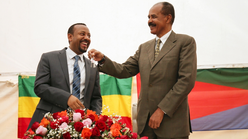 Eritrea''s President Isaias Afwerki receives a key from Ethiopia''s Prime Minister Abiy Ahmed