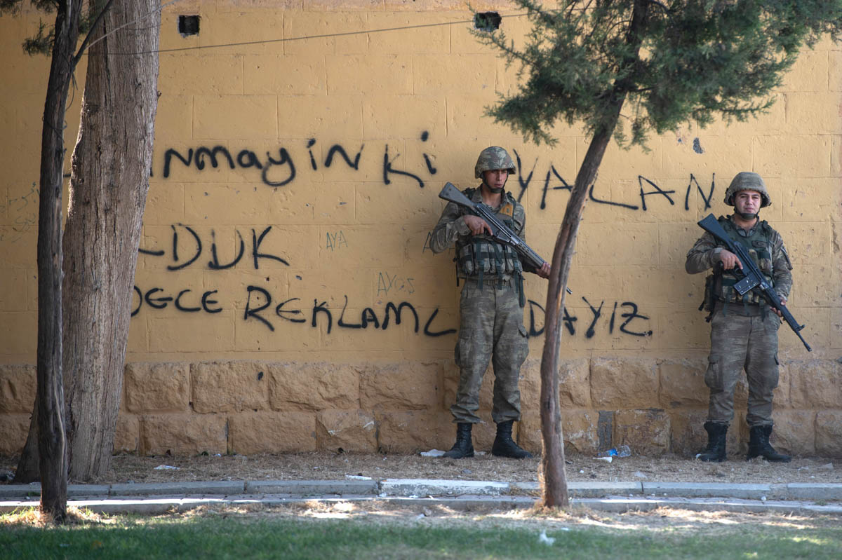 Turkish soldiers stand guard near the Turkey Syrian border on October 10, 2019 in Akcakale, Turkey. The military action is part of a campaign to extend Turkish control of more of northern Syria, a lar