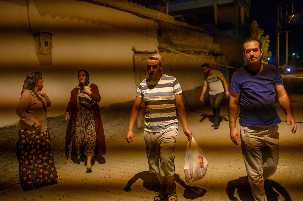 People leave after a mortar sent from Syrian side hit their house in Akcakale in Sanliurfa province on October 9, 2019. Turkey has launched a broad assault on Kurdish-controlled areas in northeastern