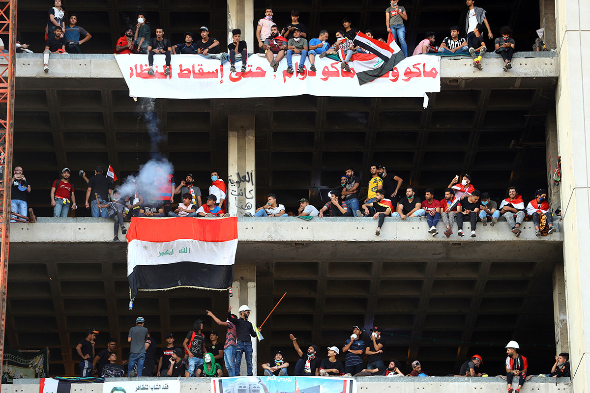 Iraqi demonstrators are seen inside the high-rise building, called by Iraqi the Turkish Restaurant Building, during anti-government protests in Baghdad, Iraq November 2, 2019. REUTERS/Ahmed Jadallah T