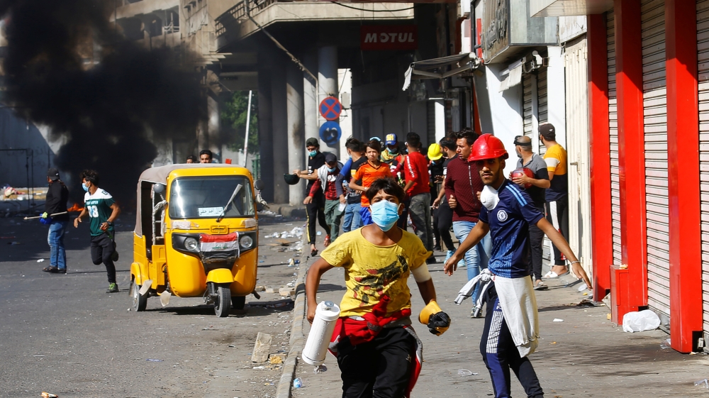 Demonstrators take part during the ongoing anti-government protests in Baghdad