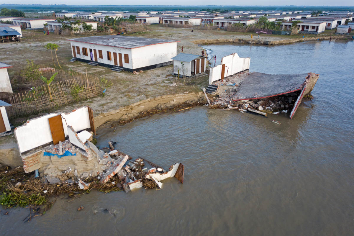 People who lost their belongings by river erosion and took shelter in shelter home now eroded again in Meghna river in Bangladesh. Sea level is projected to rise 0.4 to 1.5 meters on the Bangladesh co