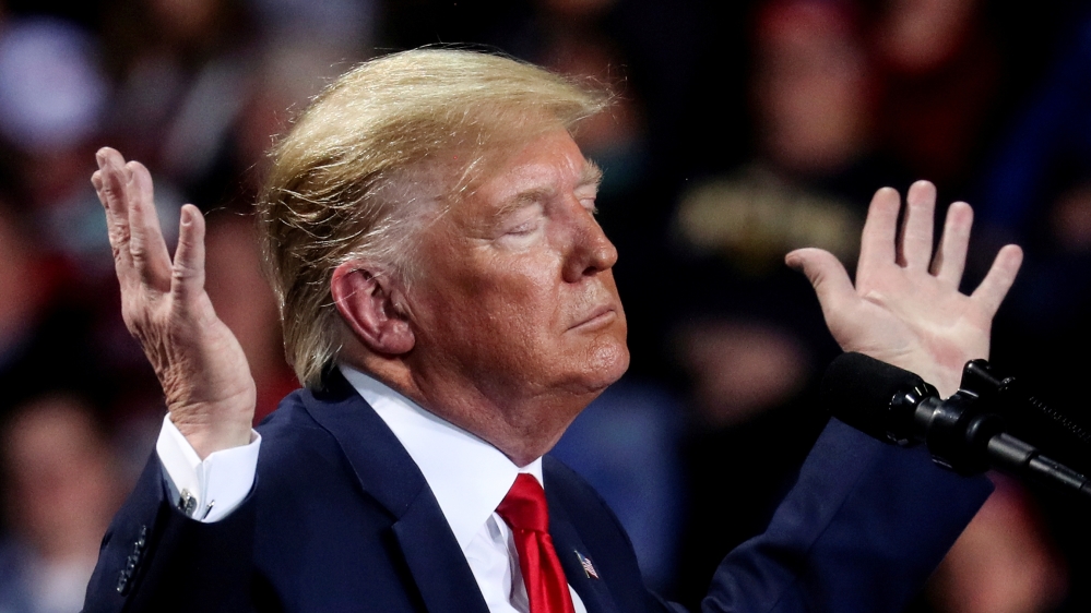 U.S. President Donald Trump reacts during a campaign rally in Battle Creek, Michigan, U.S., December 18, 2019. REUTERS/Leah Millis? TPX IMAGES OF THE DAY