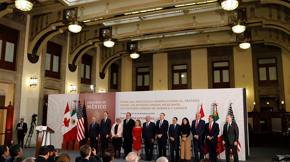 Mexico''s President Andres Manuel Lopez Obrador, Canadian Deputy Prime Minister Chrystia Freeland and US Trade Representative Robert Lighthizer pose next to other representatives during a meeting at