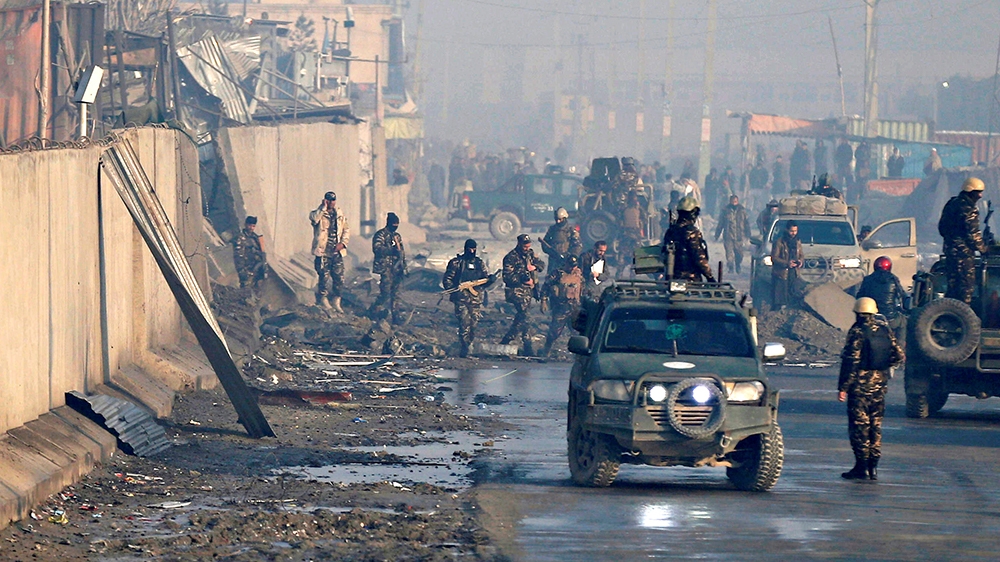 Afghan security forces inspect the site of a car bomb blast in Kabul, Afghanistan January 15, 2019. REUTERS/Mohammad Ismail