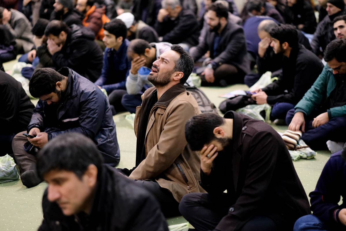 A mix of grief and anger befall of the crowd of mourners as they awaited the funeral cortege of Soleimani.