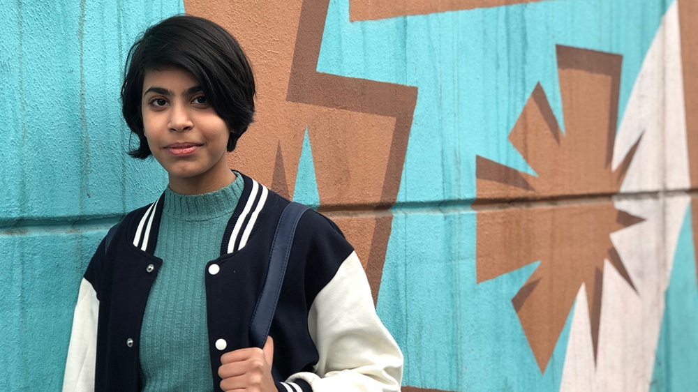 Dameer Muhannad, 13, regularly attends the Tahrir Square protest site with her family and fellow students