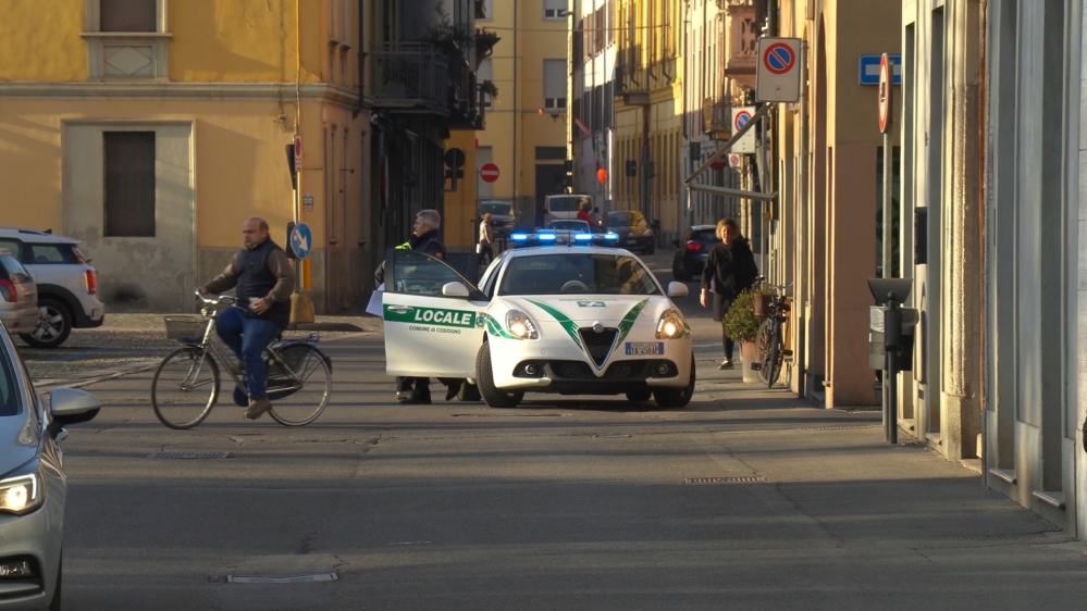 A police car is seen in the village of Codogno after officials told residents to stay home and suspend public activities as 14 cases of coronavirus are confirmed in northern Italy in the province of Lodi, Italy, February 21, 2020 [Reuters]