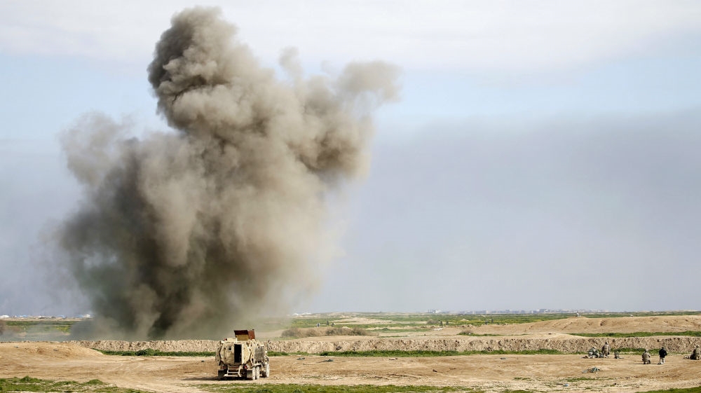 Iraqi soldiers from the army''s 72nd infantry brigade participate in a live ammunition training exercise with U.S.-led Coalition trainers at Besmaya military base in south of Baghdad