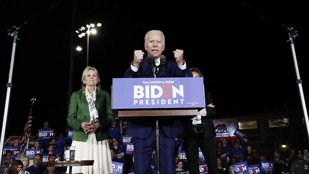epa08268327 Former US Vice President Joe Biden speaks during his Super Tuesday event at the Baldwin Hills Recreational Center in Los Angeles, California, USA, 03 March 2020. Fourteen states are holdin