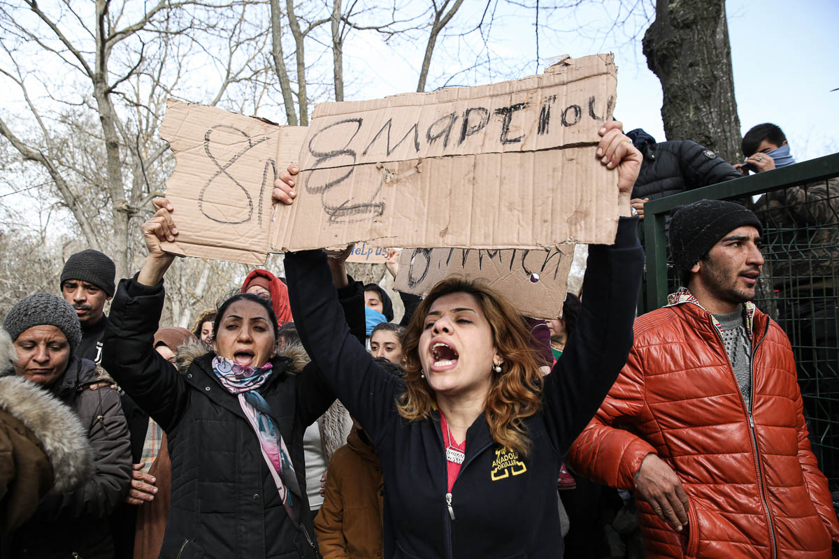 EDIRNE, TURKEY - MARCH 08: Women Asylum Seekers, waiting at Turkey''s Pazarkule border crossing to reach Europe, stage a demonstration at the buffer zone demanding to open the gate during ''Internationa